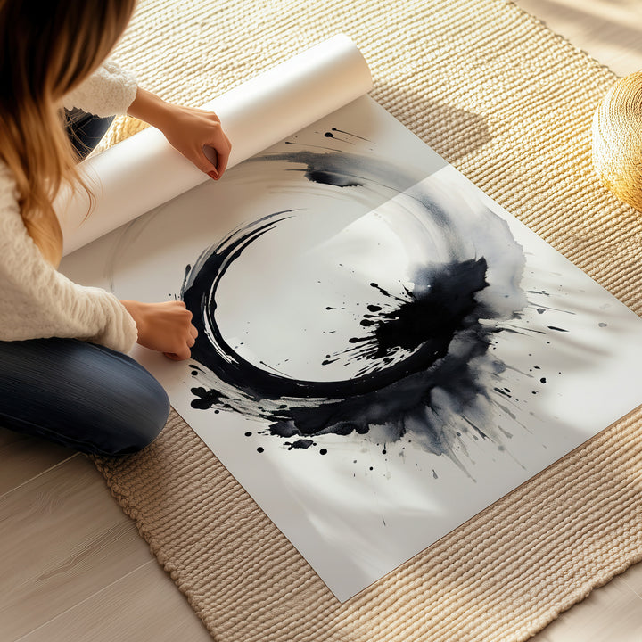 Person unrolling the 'Circle of Life' fine art giclée print on the floor, showcasing the elegant ink stroke design.