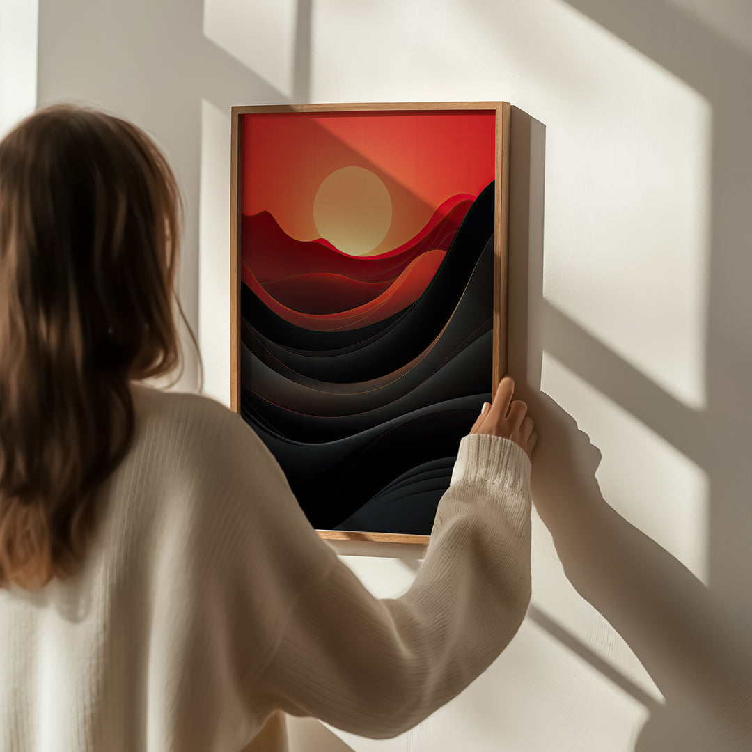 Woman hanging Dawn of Waves fine art print by Papanee Studio – abstract minimalist artwork featuring a serene sunset and wave patterns for elegant decor.