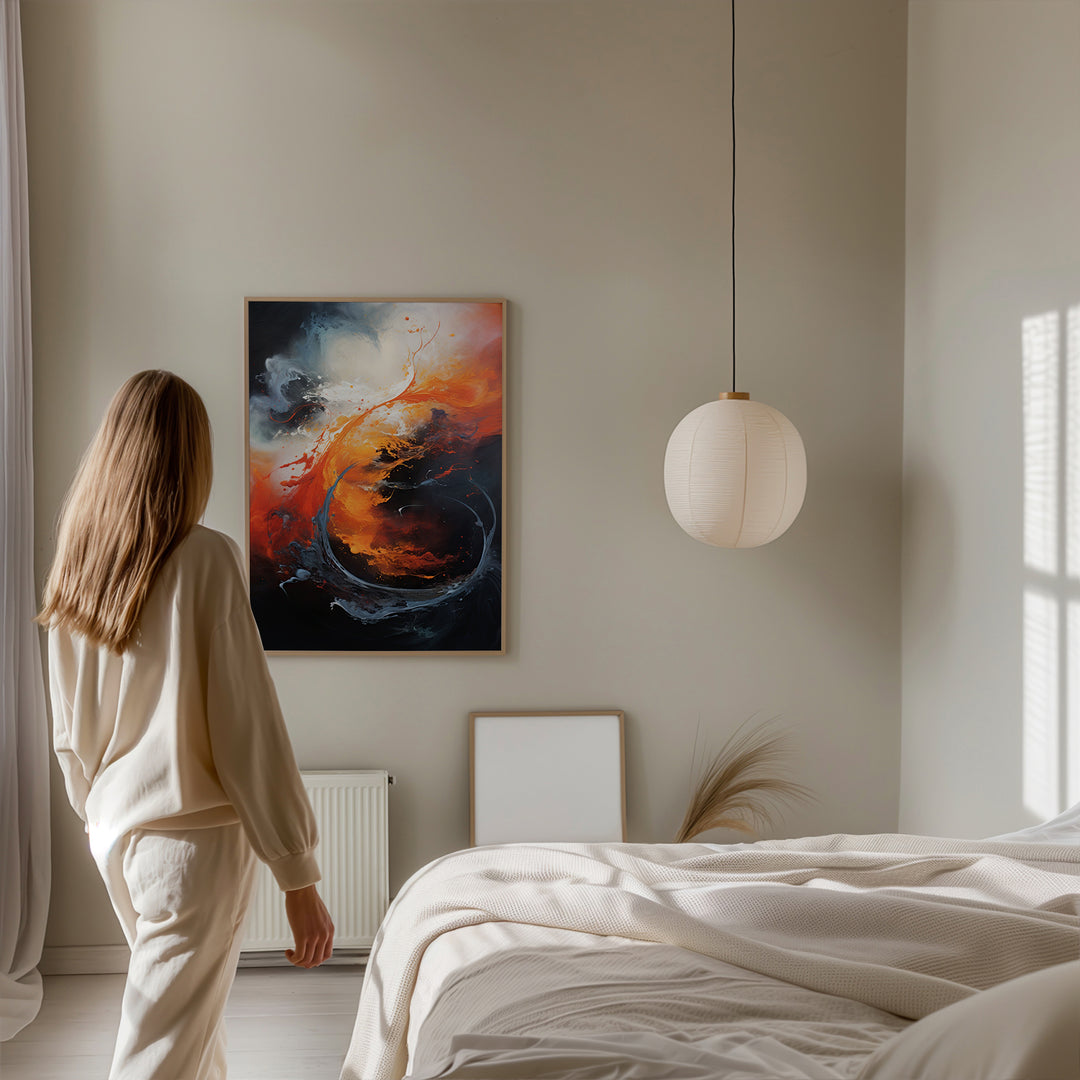 Woman admiring Elemental Fusion fine art print by Papanee Studio – abstract painting capturing the elemental forces of fire and water in vibrant swirling forms.