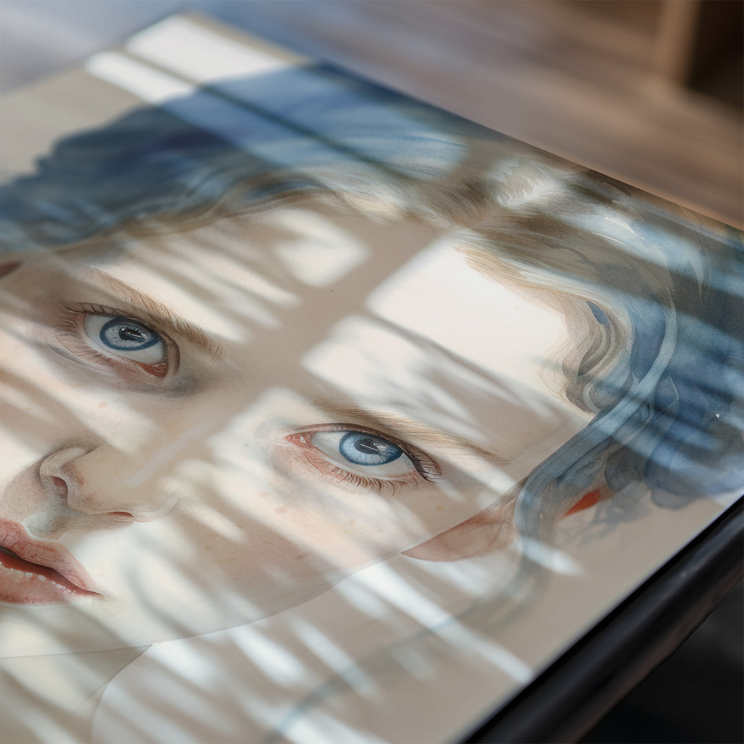 A close-up of the 'Wintersoul Decora' giclée print, partially covered in dramatic window shadows, emphasizing the subject’s piercing blue eyes and fine watercolor details. A luxurious statement piece.